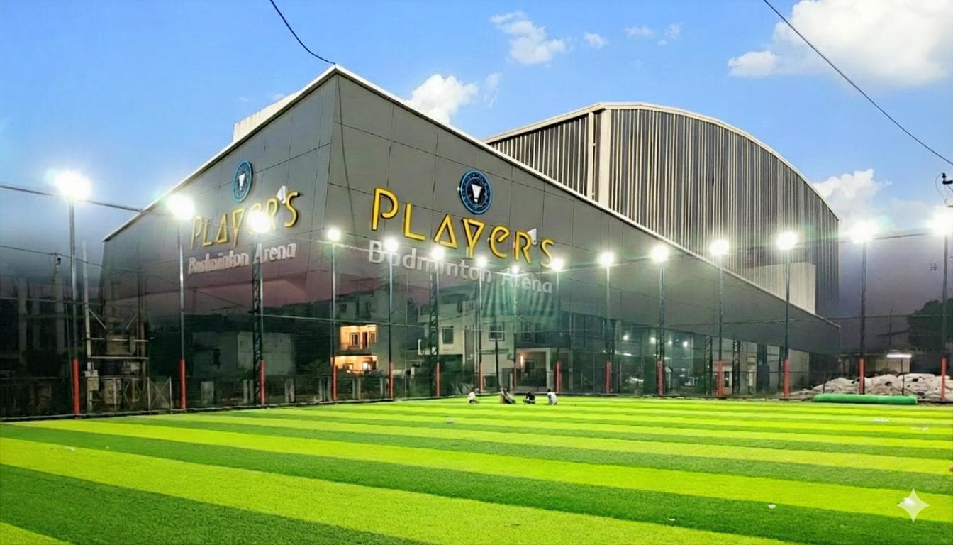 A modern, empty sports arena with bright lights